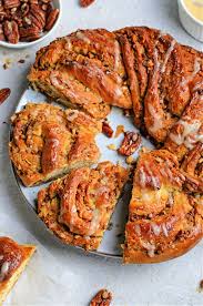 These bread wreaths are made from intertwined pieces of dough with layers of cinnamon and sugar. Maple Cinnamon Braided Bread Wreath Twisted Bread