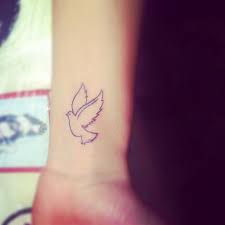 21 fantastic dove tattoos on wrist; 50 Cute And Lovely Dove Tattoos For Men And Women