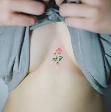 The Daintiest Pink Rose On Sternum Hidden Tattoos Dainty Tattoos Sternum Tattoo