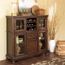 The rich look of the burnished brown finish flows beautifully over the decorative. Ashley Furniture Porter 12010500035700 Server With Storage Cabinet Coconis Furniture Mattress 1st Servers