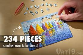 Sold in a compact 4 x 8 collectible tin box, this puzzle will fit anywhere! The World S Smallest Jigsaw Puzzle 234 Die Cut Pieces
