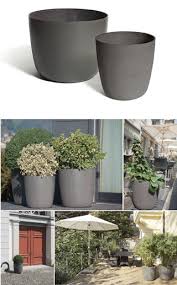 Square planters, especially, make a contemporary statement and play well with linear outdoor furniture, like a chaise. Martin Mostboeck Kyoto Large Modern Round Planter Pot Nova68 Com