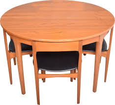 Maybe you would like to learn more about one of these? Vintage Teak Round Nathan Table Four Tuck Under Chairs 1960s Design Market