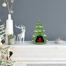 Explore georg jensen's beautiful christmas tree candle holders and christmas candle holders. 25 Best Christmas Candle Holders Christmas Candle Centerpieces And Decorations