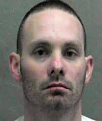 Local man charged in burglary