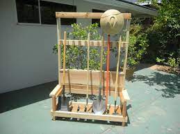 Learn how to clean your garden tools quickly (and sharpen them automatically) by setting up a simple tool cleaning station in your yard. Garden Tool Rack With Foldable Bench Garden Tool Rack Garden Tool Storage Garden Tools