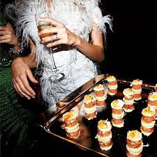 Some guests arrive early at the reception. 6 Essential Components Of A Glamorous Cocktail Party Reception