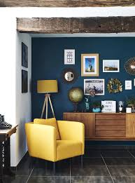 If you long for something a little brighter, electric turquoise might be just the thing to wake the room up. Maybe A Blue Wall With A Yellow Shelf Blue Walls Living Room Blue Bedroom Walls Yellow Living Room