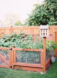 In Winnipeg An Inspired Home Inside And Out Garden Beds Yard Design Raised Garden Beds