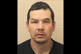 Man charged with murder breaches bail conditions