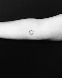 Which Tiny Tattoo Should You Get Sun Tattoo Minimalist Tattoo Tattoos