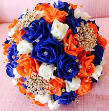Beautiful Posy For A Bride Wearing Full Indian Dress In Royal Blue Orange Gold And Orange Wedding Bouquet Orange Wedding Decorations Blue Wedding Decorations