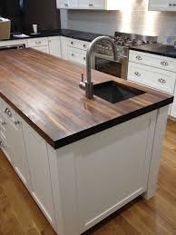 Prefinished Walnut Butcher Block Countertop Add Beauty And Value T Replacing Kitchen Countertops Kitchen Remodel Countertops Walnut Butcher Block Countertops