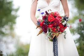 Wedding bouquets red and navy. Rich Red Bridal Bouquet With Navy Lace Ribbon