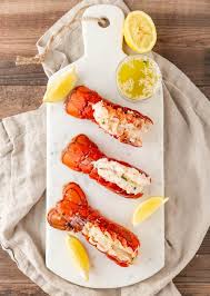 Serve your boiled lobster tails with melted butter or a wedge of lime, alongside boiled corn on the cob. Boiled Lobster Tails With Garlic Lemon Butter Basil And Bubbly