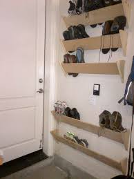 Homemade Shoe Racks For Our Garage Walls By The House Entrance Magically Cleans Up Our Hallway Diy Shoe Storage Garage Shoe Storage Homemade Shoe Rack