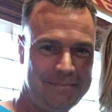 How to program garage door opener to an aftermarket button in Toyota Tacoma?