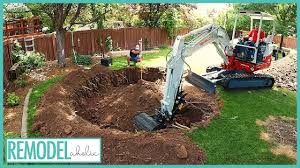 If your children would love a floor level trampoline and you want to let them bounce without fear of them falling off, you need to know how to sink a trampoline! In Ground Trampoline Install Time Lapse 14 Tips Before Installation Remodelaholic Youtube