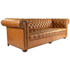 Chaise longue and chesterfield are semantically related in sofa topic. Tobacco Brown Leather Chesterfield Sofa For Sale At 1stdibs