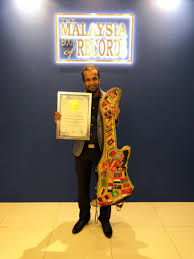 Malaysia largest bookstore offering books, magazines, music, cd, manga and much more. Guitar Strumming Globetrotter Gets Into Malaysia Book Of Records Nestia