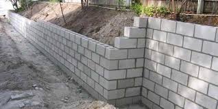 Cost To Build A Retaining Wall In 2020 Inch Calculator Building A Retaining Wall Concrete Block Retaining Wall Retaining Wall Construction