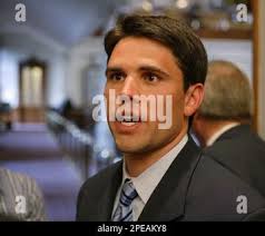 Rep. Patrick Rose, D, Dripping Springs, talks to journalists off the floor  of the Texas House of Representatives