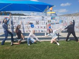 A few Ag Science II students, and our FFA Officers spent the afternoon  setting flags along N Elm for the City's 9/11 Memorial display. We enjoy  being able to do this every