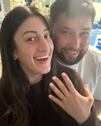 A happy couple are engaged to be married, after proud dad Bruno Ulmkalns  went down