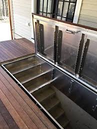 I have a metal outside door leading to steps into my basement. Hidden Access To Cellar Lucigold All Aluminum Basement Bulkhead Door Bulkhead Doors Basement Decor Basement Remodeling