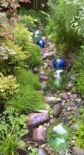 Pin By 12 000 Rain Gardens On Garden Goodness Rain Garden Design Sloped Garden Rain Garden