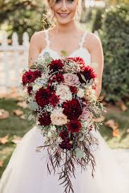 Lpayok artificial flowers 4 pcs 37.4 inch plastic fake winter jasmine bouquets long stem faux flower branches for indoor outdoor wedding party home office decor, white. Winter Bridal Bouquet Dark Red Wedding Red Bouquet Wedding Red Rose Bouquet Wedding