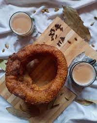 Selroti And Chiya Nepali Food Sweet Tooth Tea Food Photography Tea Traditional Food Of Nepal Food Nepali Food Traditional Food