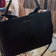 It is inspired by simple yet flattering silhouettes that lets the quality of malaysia's for handbag is called as cali bag that features symmetrical sash bow in hexagonal knots at the sides which are finished with brushed metal hardware. Christy Ng Handbag Price Off 53