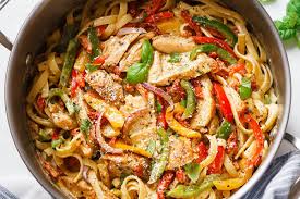 Chicken Pasta In Creamy Pesto Sun Dried Tomato Sauce Eatwell101