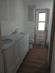 Wondering whether you should make a bathroom vanity backsplash part of your bathroom design or not? View How To Install Bathroom Vanity Against Wall Gif Billywaters