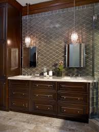 The metal is covered in a premium finish to complement other fixtures. Dark Vanity With Marble Countertop Glass Pendant Lights Hgtv