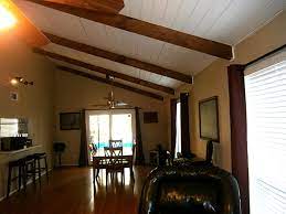 Complete interior renovation of a 1980s split level house in the virginia suburbs. Living Room Half Vaulted Ceiling With Beams Novocom Top
