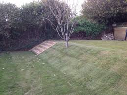 You may need to direct water away from the foundation of your home, or you may need to retain moisture where your lawns and gardens are. Turfing On A Slope Landscaping Lawn Turfing Landscape Design Backyard Lawn