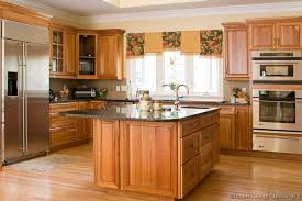 medium wood cabinets, golden brown
