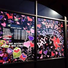 L Ve Is In The Air Valentine S Day Window Painting Valentines Window Display Window Painting Painted Window Art