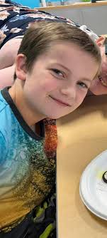 A family photo with them dressed up in various Halloween costume costumes