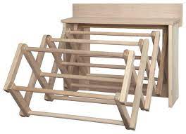 The rack folds out to provide lots of room and airflow for delicates and other items i prefer to air dry, and folds flat against the wall after building this rack, i am certain that with a little creativity, many crib panels, baby safety gates and other slatted panels can be repurposed into clothes drying racks. In Stock Handmade Amish Maple Folding Drying Rack Wall Unit Transitional Drying Racks By Saving Shepherd Houzz