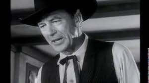 Louis armstrong blowing his trumpet while grace kelly looks on in a scene from the movie high society. High Noon 1952 Original Trailer Gary Cooper Grace Kelly 1950s Classic Westerns Youtube