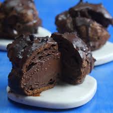 Triple Chocolate Cream Puffs Cooking Panda Chocolate Cream Puff Cream Puffs Chocolate Recipes