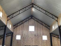 The blocks are located at the bottom of the beam (flush with the bottom of the sides). Galvanized Steel Ceiling Against The Exposed Beams And Shiplap Are A Wonderful Contrast Metal Building Homes Exposed Steel Beams Metal Beams