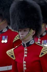 This Bandswoman Of The British Army S Famous Scots Guards Proudly Wears Her Bearskin Hat Well And If You M Military Women Military Outfit British Army Uniform