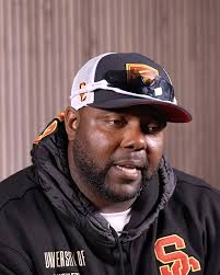 @uscfb DL coach Eric Henderson has used his childhood adversity to empower  him and influence his coaching. This is his story of his faith and  resilience ✌️