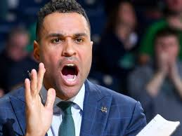 Ex–Notre Dame assistant coach Ryan Ayers charged with voyeurism, battery