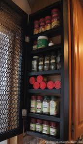 Remodelaholic How To Build A Space Saving Spice Cabinet Cabinet Spice Rack Under Cabinet Storage Clever Kitchen Storage