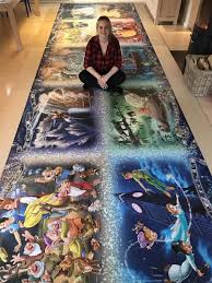 Disney princess pictures should be completed in record time score increases. Girl Completes 40 320 Pieces Largest Jigsaw Puzzle Disney Puzzles Jigsaw Puzzles Disney Jigsaw Puzzles
